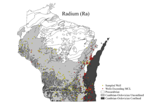 A map of Wisconsin showing wells tested for radium and those that exceed drinking water standards. Wells that exceed standards are concentrated in the eastern half of the state.